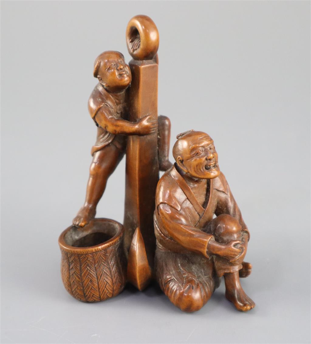 A Japanese boxwood okimono of two sailors and an anchor, Meiji period, 9.5cm high